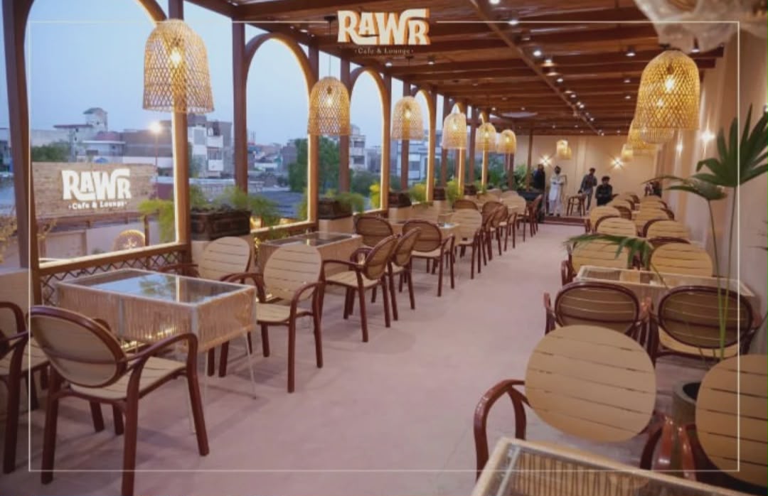 Arched pergola with rattan pendant lamps lining the open-air corridor